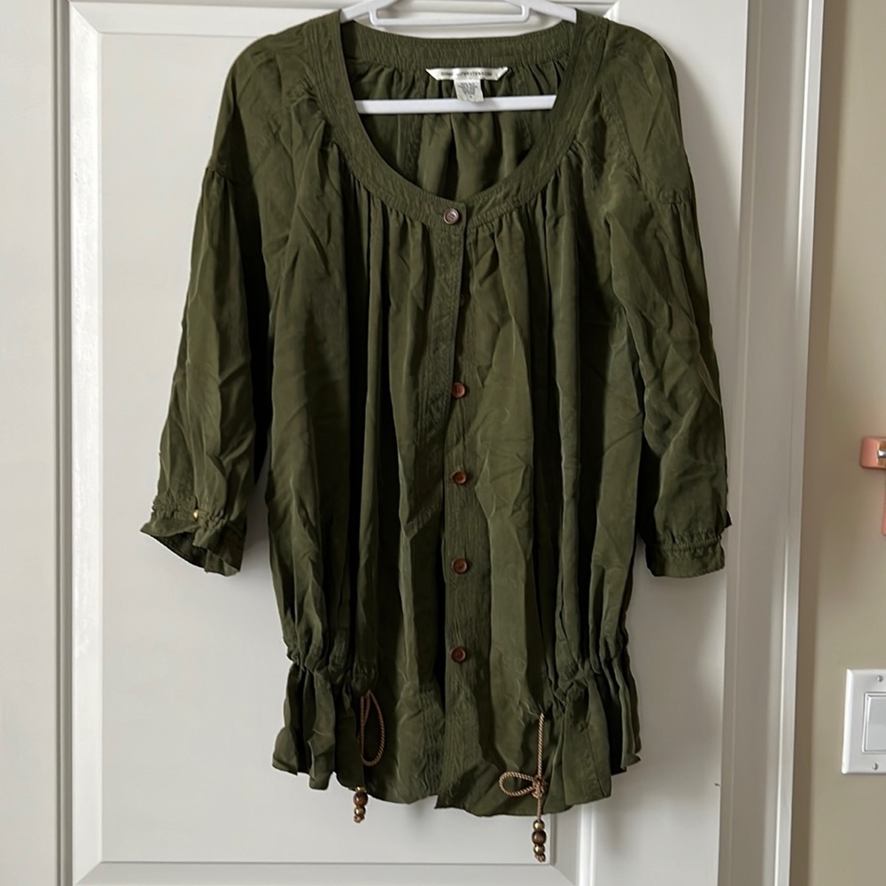 Gently worn army green jacket with cinched hem